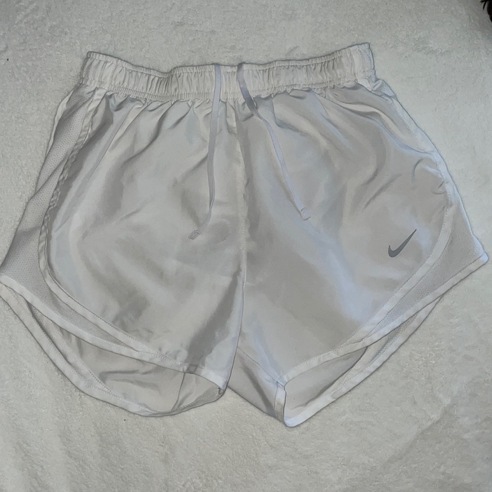 Size small white nike shorts.